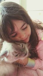 Portrait of a beautiful young woman with eyes closed