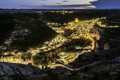 High angle view of illuminated city at night