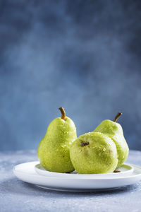 Close-up of fruits in plate on table