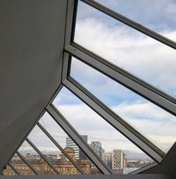 Low angle view of built structure against cloudy sky