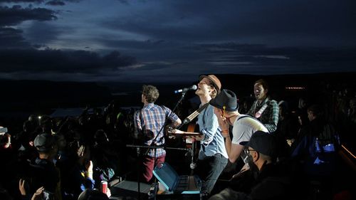 People enjoying music concert