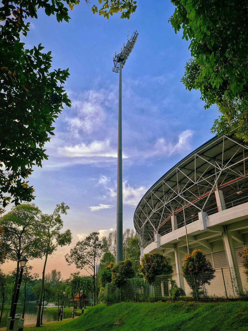 LOW ANGLE VIEW OF STRUCTURE AGAINST CLOUDY SKY