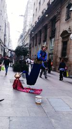 People on street in city