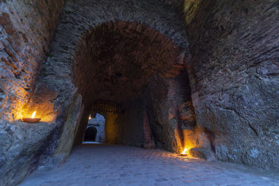 Illuminated tunnel in old building