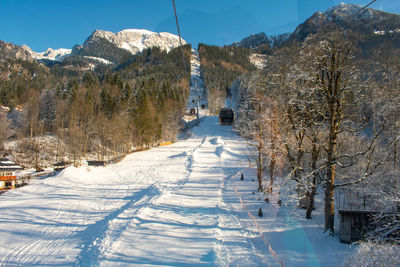 Scenic view of snow covered mountains against sky