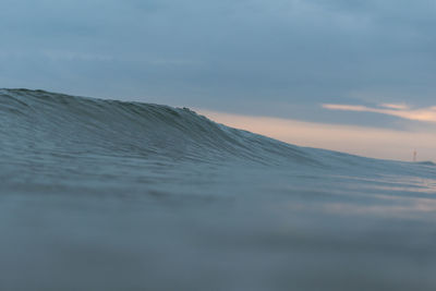 Scenic view of mountains against sky during sunset