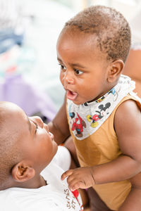 Cute baby boy with his brother