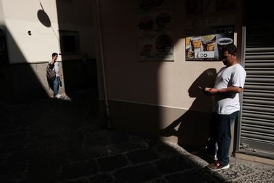 People standing at entrance of building