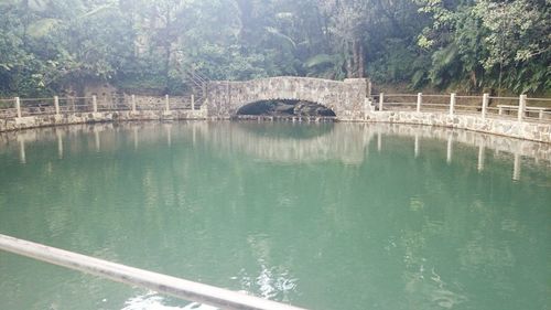 Arch bridge over river