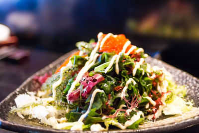 Close-up of salad in bowl on table