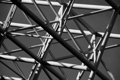 Low angle view of metallic structure against sky