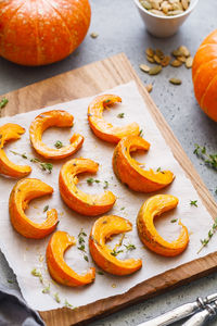 High angle view of pumpkin slices on table