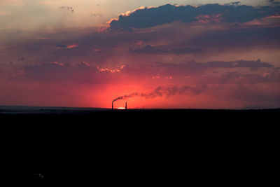 Scenic view of dramatic sky over sea during sunset