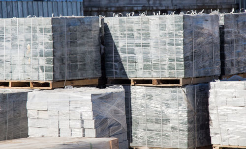 Stack of firewood in row