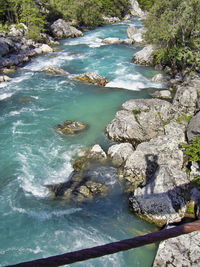 High angle view of rocks by sea