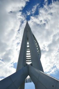 Low angle view of building against cloudy sky