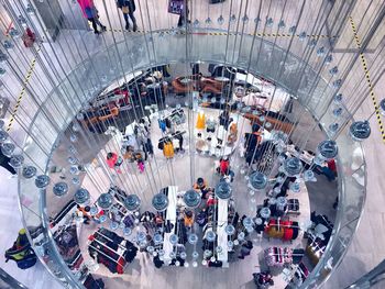 High angle view of people walking in modern building