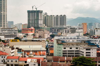 Buildings in penang, malaysia. city against sky.