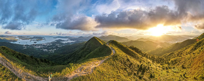 Panoramic view of land against sky during sunset