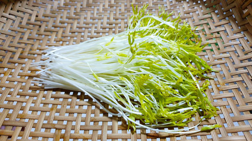 High angle view of vegetables in basket on table