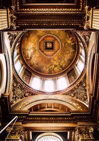 Low angle view of ornate ceiling