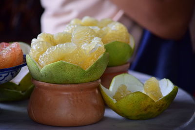 Close-up of fruits in plate on table