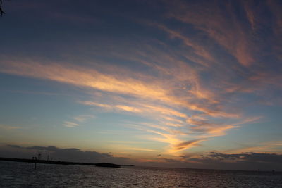 Scenic view of sea at sunset