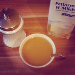 Close-up of coffee cup on table
