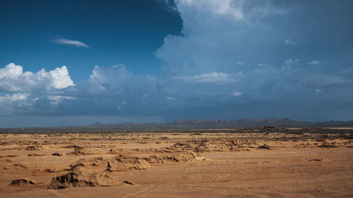 Scenic view of desert against sky