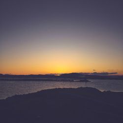 Silhouette of beach at sunset