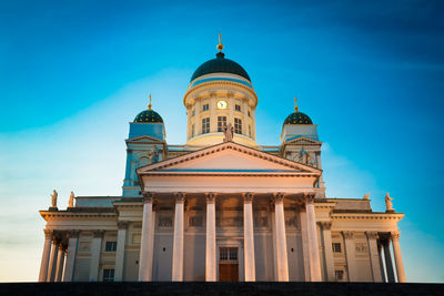 Low angle view of building against blue sky