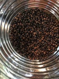 High angle view of coffee beans in jar