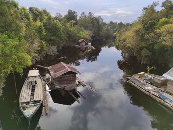 Panoramic view of lake and buildings against sky