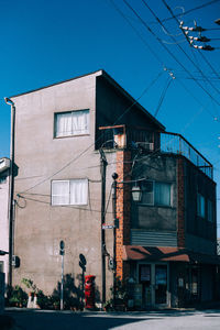 Buildings against blue sky and clouds