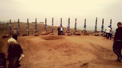 Panoramic shot of people standing against sky