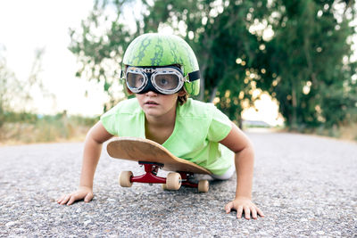 Full length of boy with toy on road
