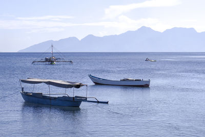 View of sailboat in sea against sky