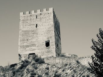 Low angle view of old building against sky