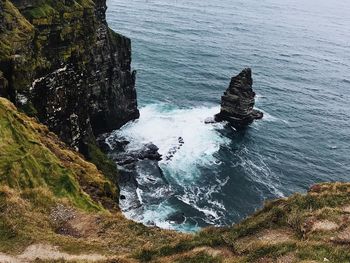 High angle view of rock formation in sea