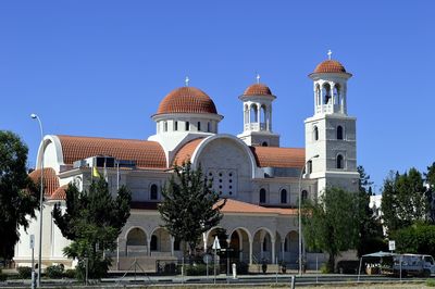 Exterior of church against clear blue sky