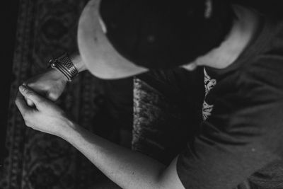 High angle view of man sitting at home