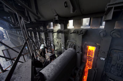 Worker working at coke oven in factory