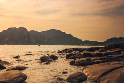 Scenic view of sea against sky during sunset