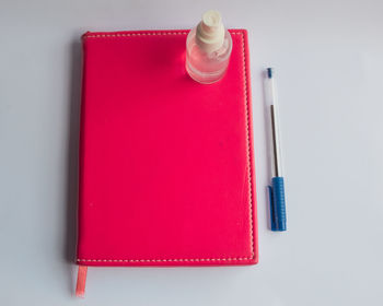 High angle view of pen on table against white background