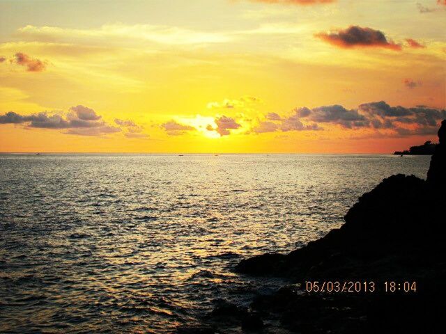 sunset, sea, water, scenics, horizon over water, sky, beauty in nature, tranquil scene, orange color, tranquility, silhouette, idyllic, nature, cloud - sky, waterfront, rippled, cloud, dramatic sky, reflection, outdoors