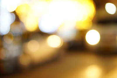 Defocused image of illuminated lights at night