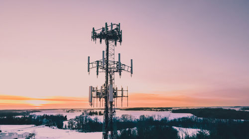 Winter sunset with radio tower silhouette