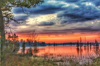 Scenic view of landscape against dramatic sky