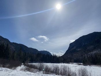 Scenic view of snowcapped mountains against sky