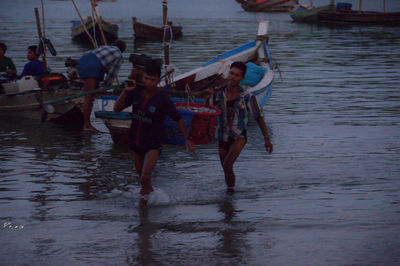 People walking on beach